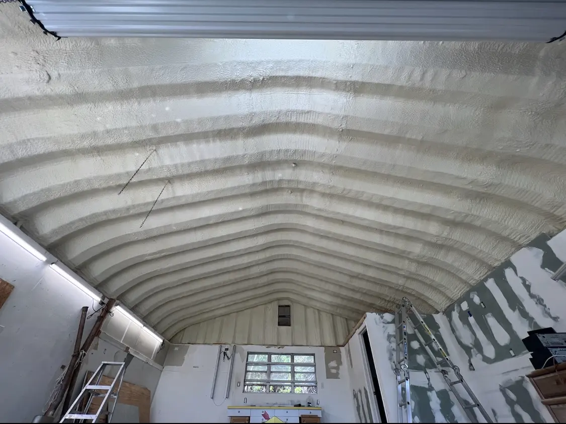 Spray polyurethane foam applied to the underside of a metal roof deck in Roselle Park